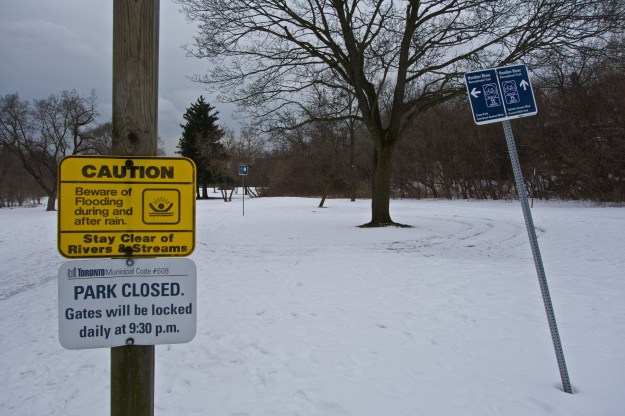 This set of signs face the parking lot. The 'Park Closed' sign is very misleading until you read the print below.