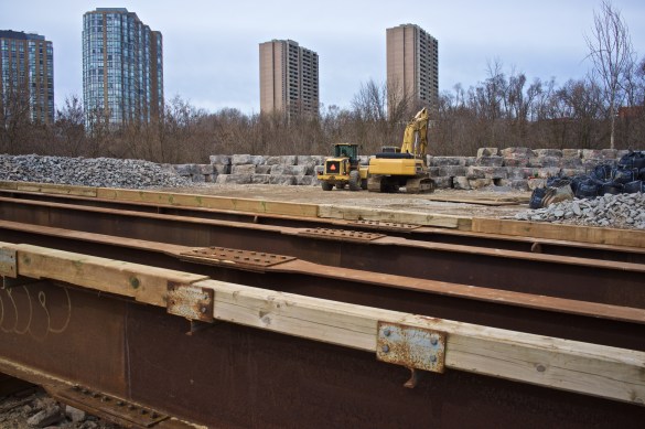 The bridge and blocks in the background.