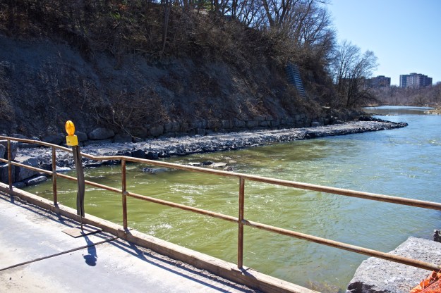 The retaining wall foundation stretches along its southern length.